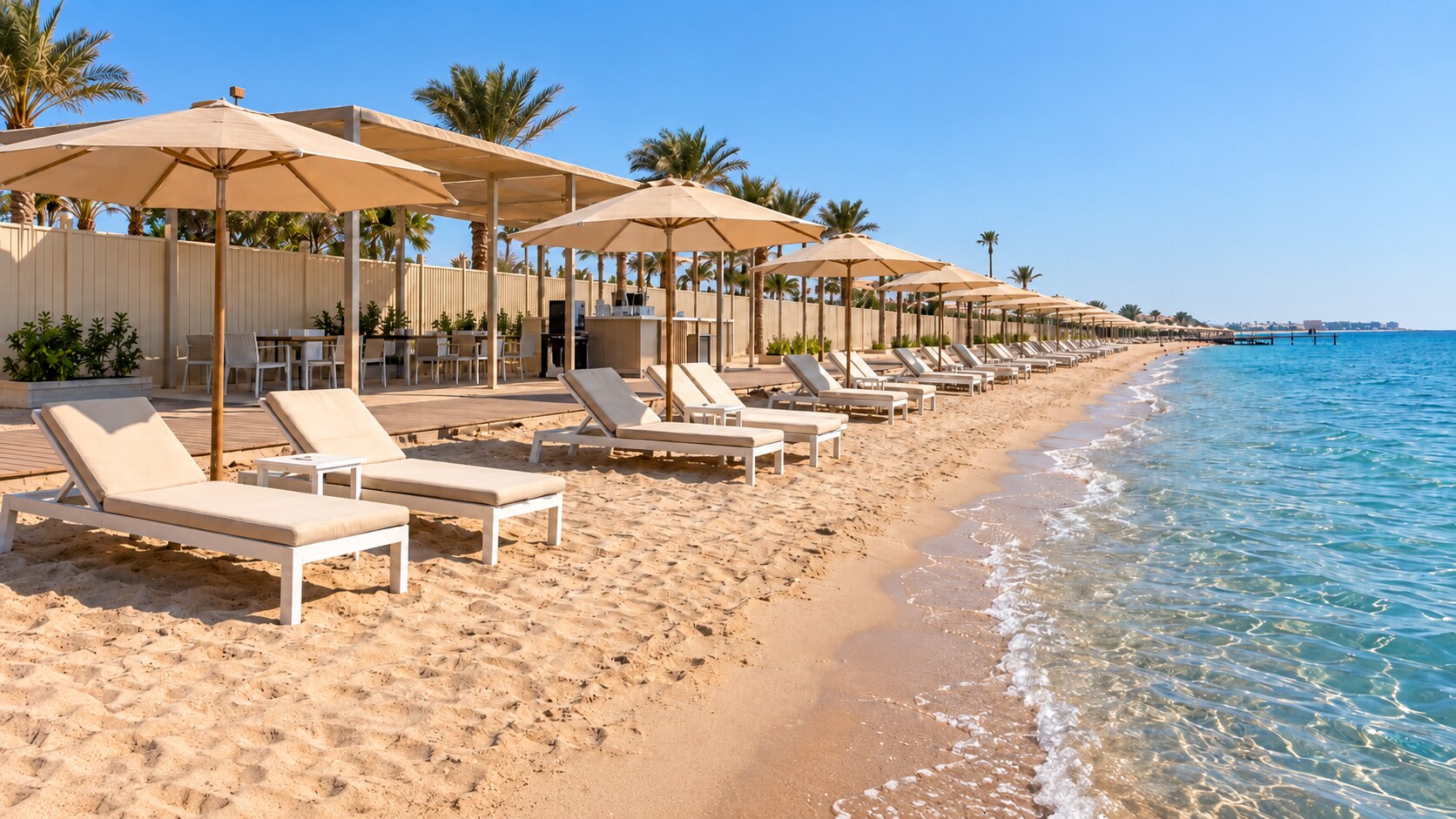 Concept of the Alternative Beach main area with sun loungers by the Red Sea